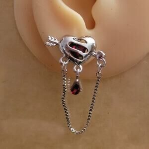 Heart & arrow crystal chain earring, red crystal caged in silver heart